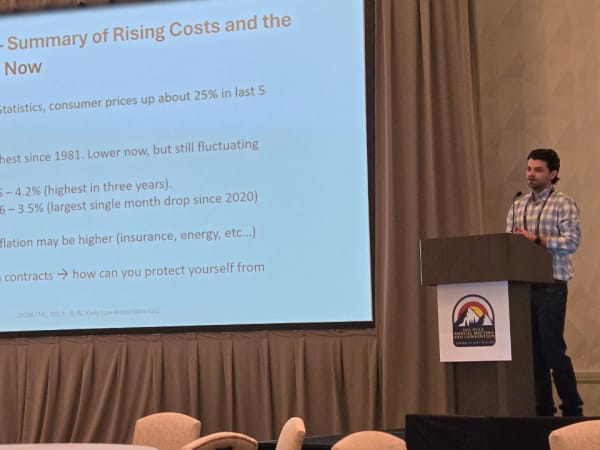 Attorney Brian Hill presents on rising transportation costs, inflation, insurance, and contracting challenges during an educational session at the 2026 NSTA conference.