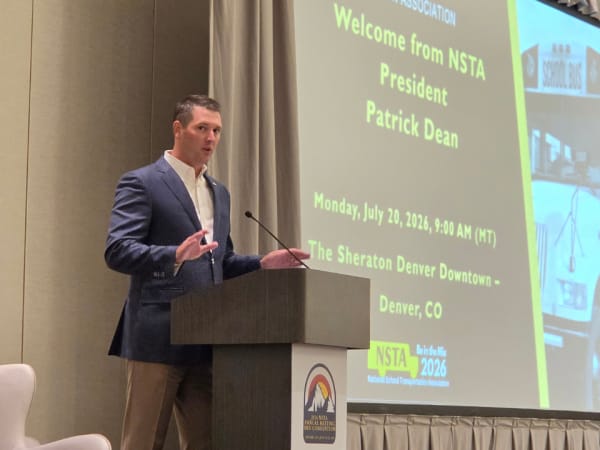 NSTA President Patrick Dean welcomes attendees during the opening general session of the 2026 National School Transportation Association Annual Meeting & Convention in Denver.