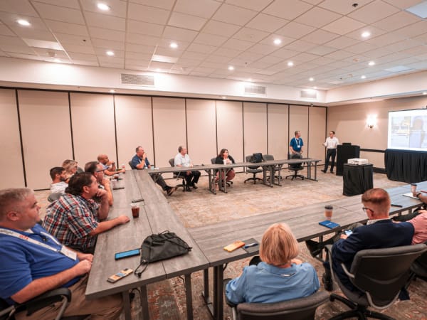 RIDE representatives present school bus and battery technology to a group of school transportation professionals during a focus group at School Bus Fleet ConneX.