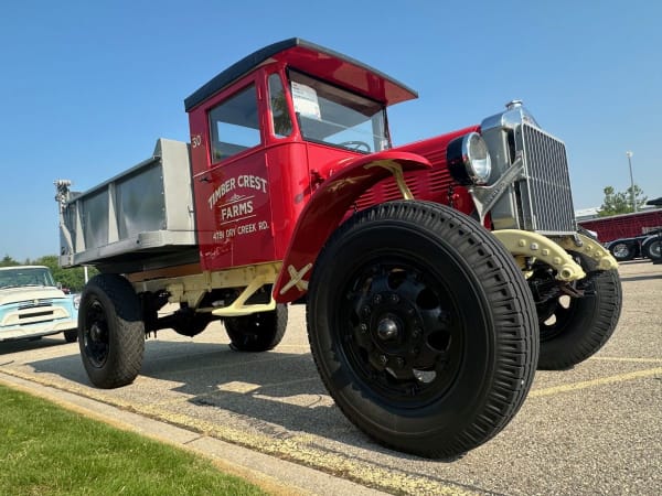 Red Sterling antique truck with dump body