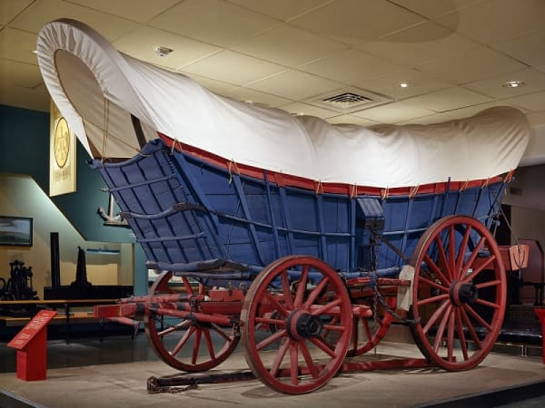 Historic Conestoga wagon used to transport freight and supplies during the 18th and 19th centuries.