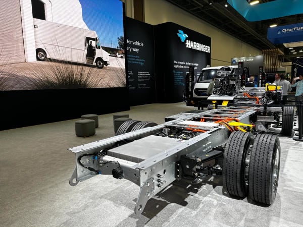 Commercial EV chassis on an expo floor. 