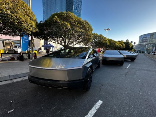 Photo of Tesla Cybertrucks in a row outside of LA Auto Show. 