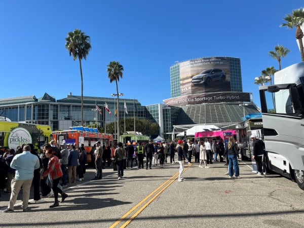 Photo of outdoor plaza with trade booths. 