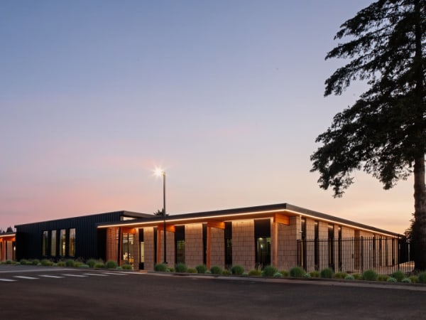Exterior image of C-TRAN's campus expansion during sunrise.