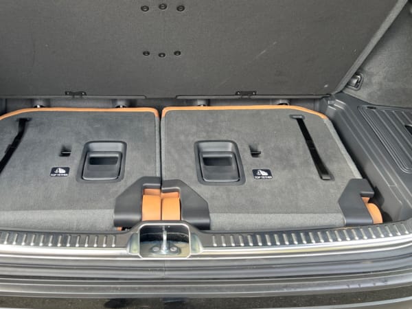 Folded down third-row seats create trunk space.