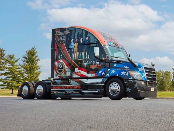 Schneider National historic trucks.