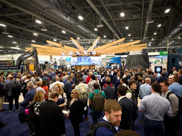 A crowded expo hall. 