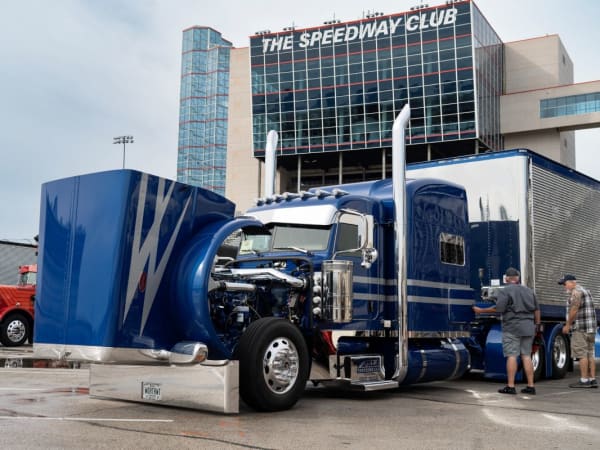 A blue Peterbilt Model 389 at the Texas Motor Speedway.