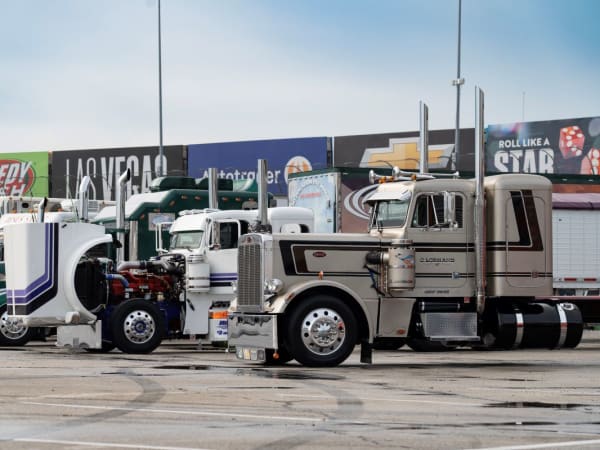 A lineup of show trucks at the Texas Motor Speedway.