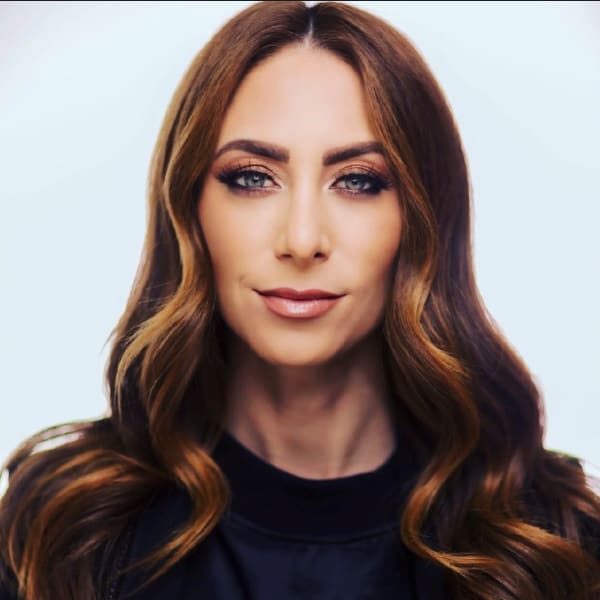 A woman with long brunette hair