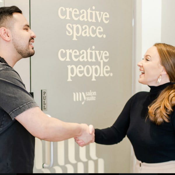 two people shaking hands