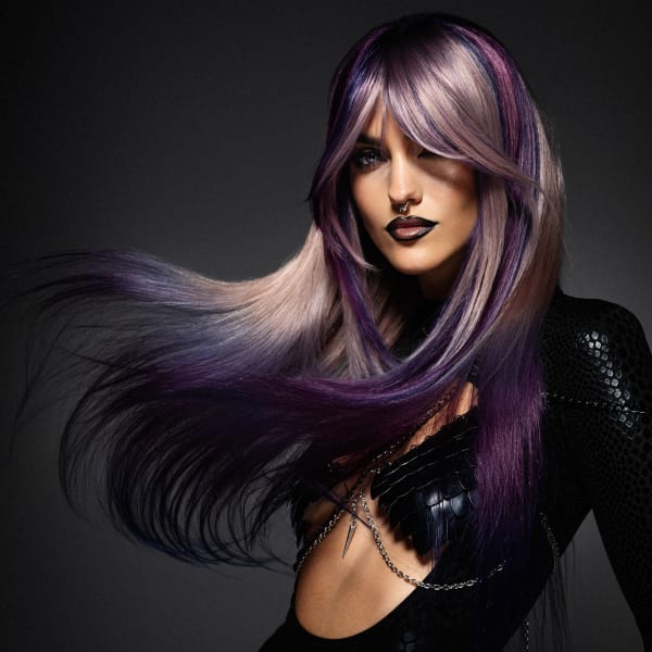 A woman with purple hair.