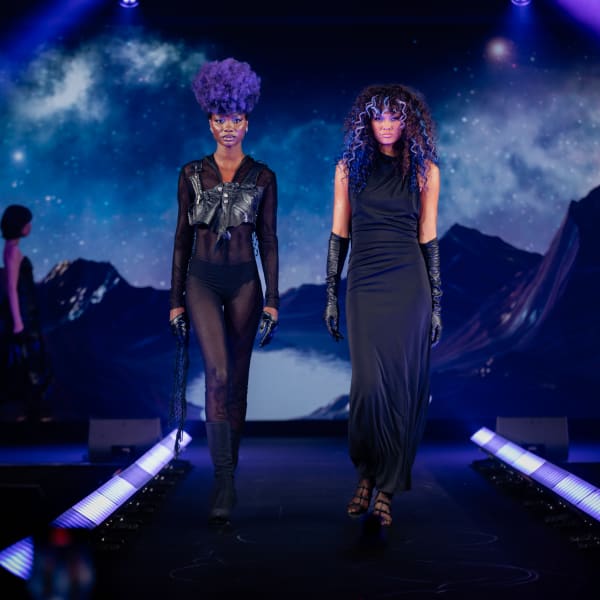 Two models on a runway.