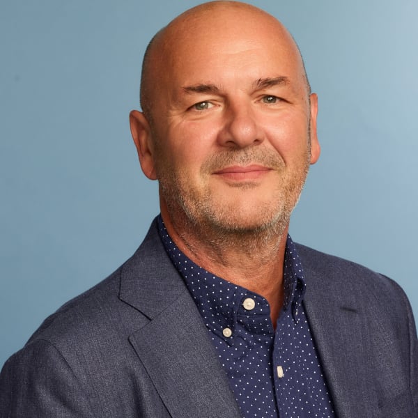 A man in a blue suit.