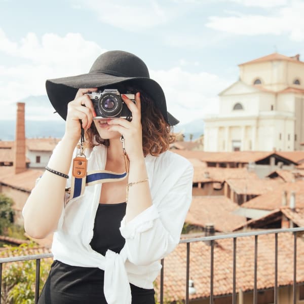 A woman taking a picture.