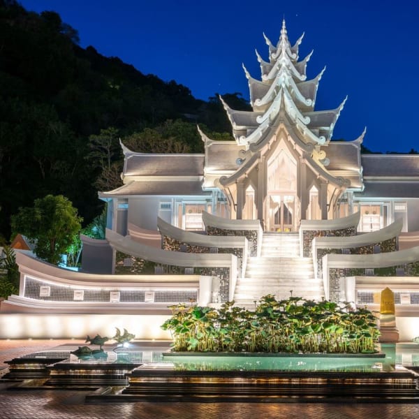 The outside of a large temple in Thailand