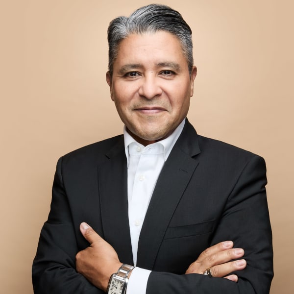 A smiling man.