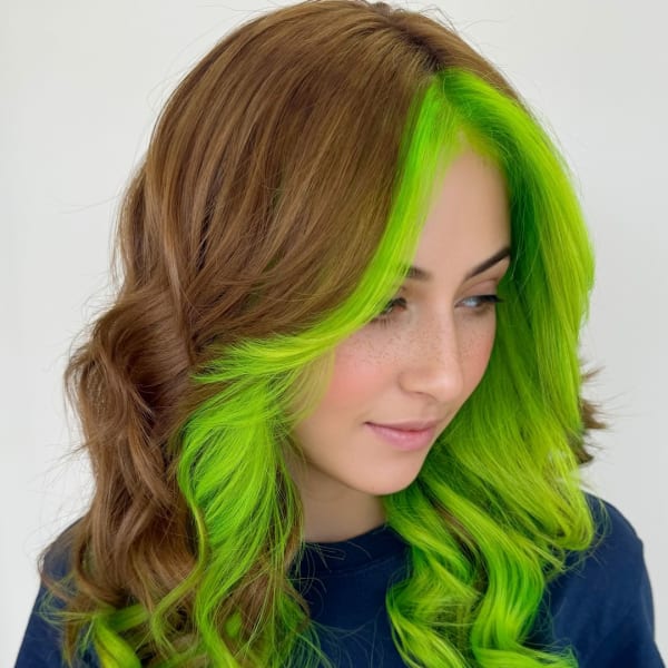 A woman with bright green hair.