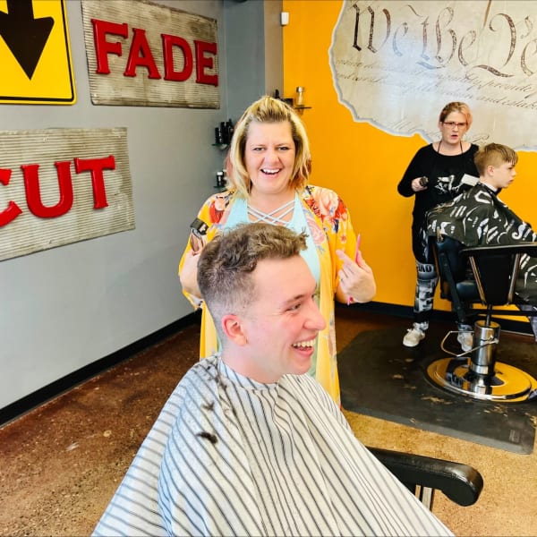 Stylists and clients at The Man Shop.