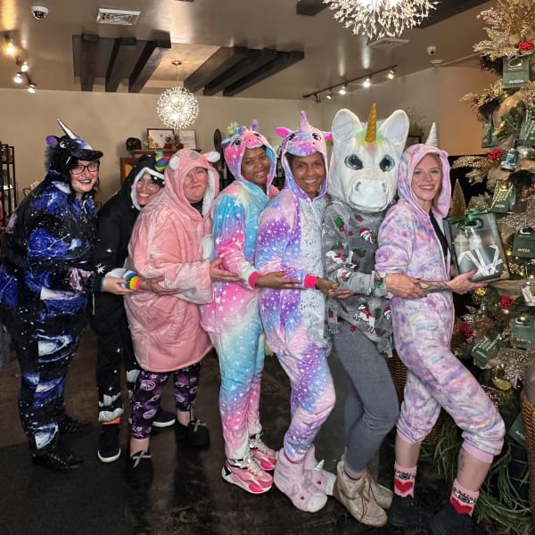 The Soleil Team dresses as unicorns.