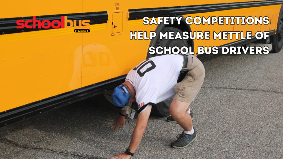 School bus driving competition judge inspects the results.