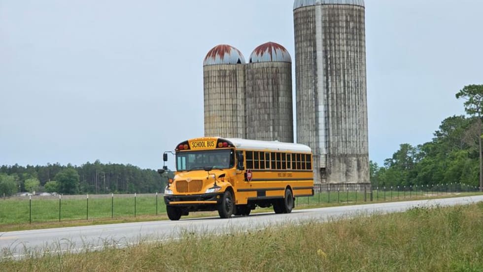 School bus with silos.