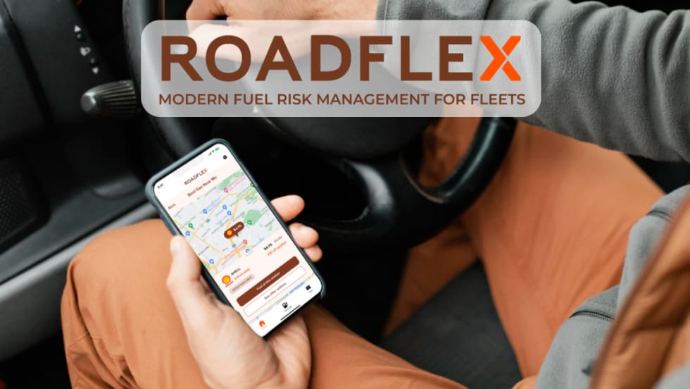 Man in driver's seat of vehicle holding a cell phone with screen displaying a fuel purchasing app, and RoadFlex logo in upper portion of main image.
