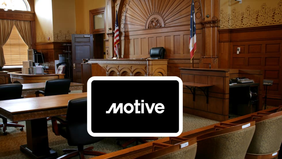 Courtroom setting with inset logo for Motive.