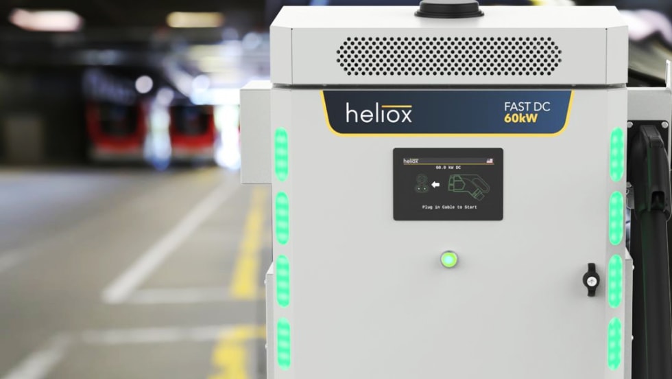 DC fast charge that looks like a large white box is located next to a parking area