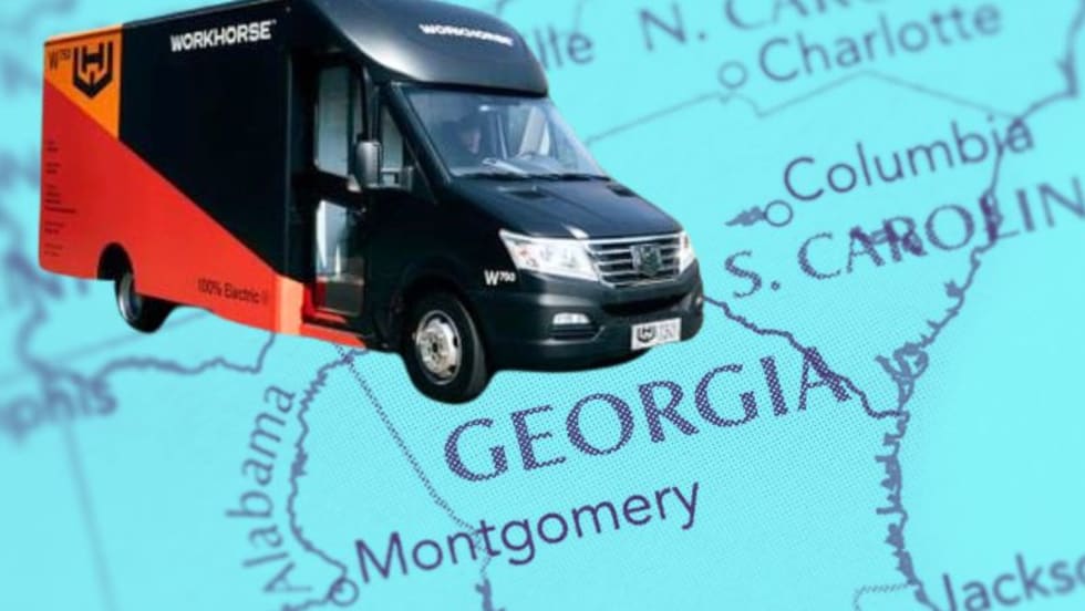 Orange and black van-type delivery truck inset against an image of a map of Georgia.