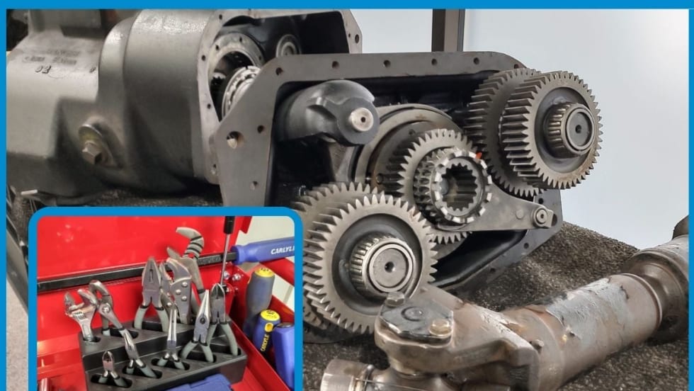 Image of a complex machine with gears and tools, industrial setting.