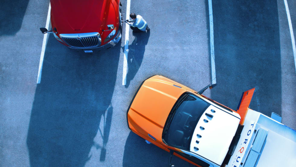 Image of a truck in a parking lot.