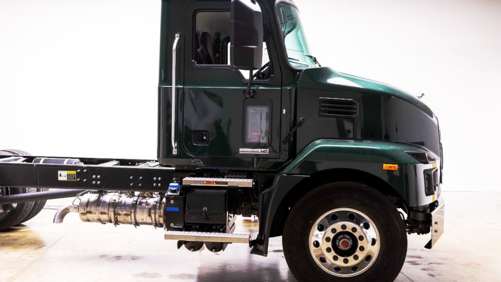 Side view of a medium duty cab truck.