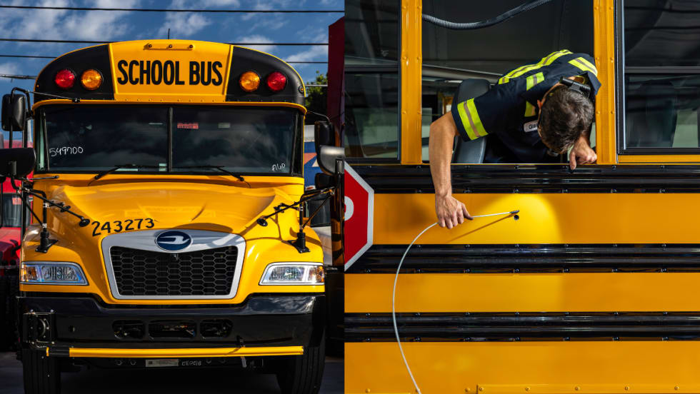 Technician adding lights to a school bus