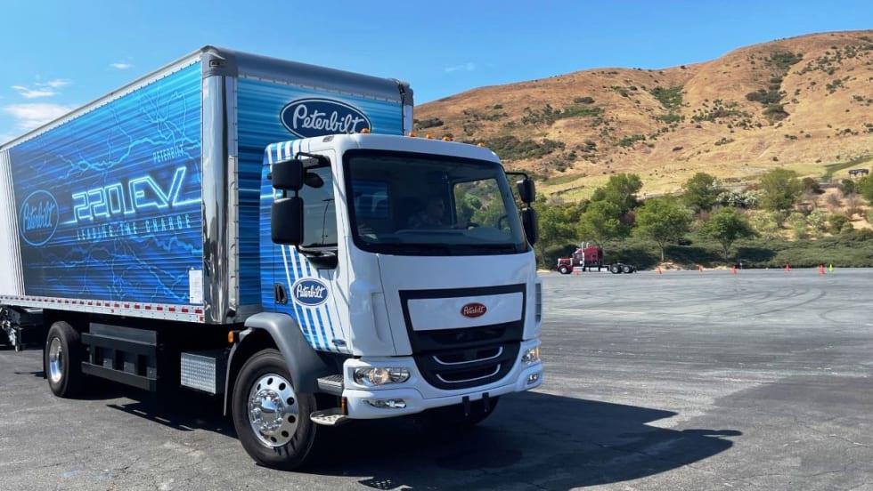 white and blue box truck 
