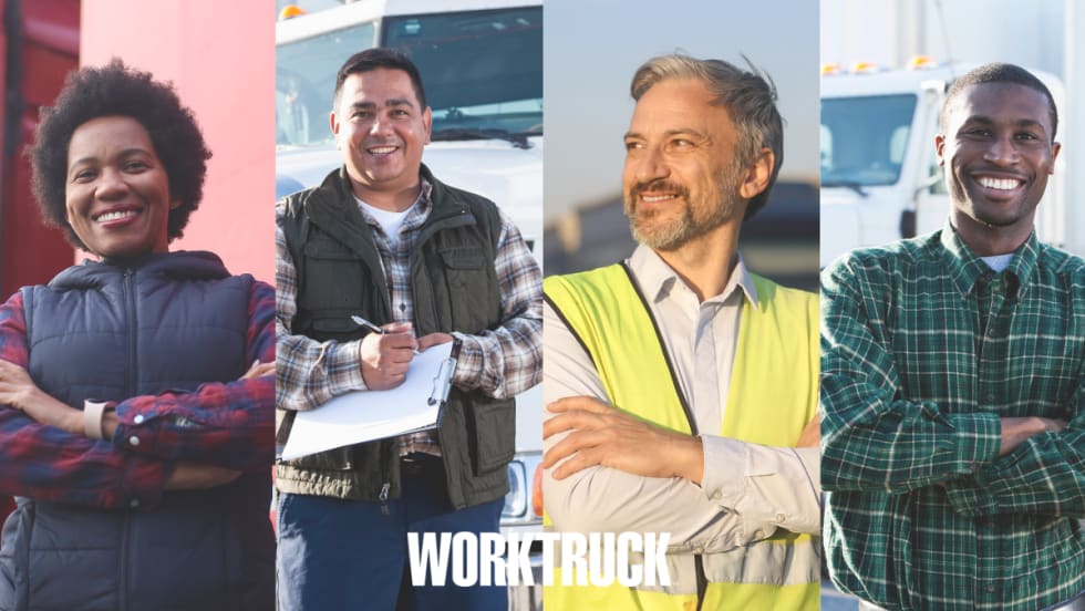 Four truck drivers smiling