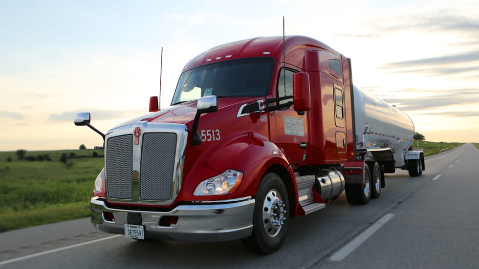 Red Groendyke tractor with tanker trailer