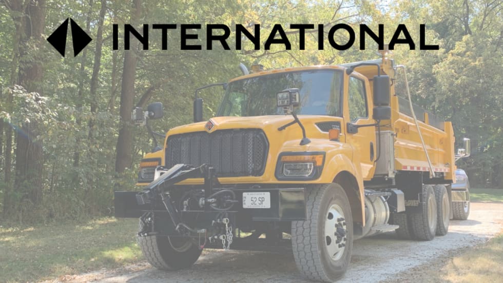 Yellow International HV dump truck with snow plow