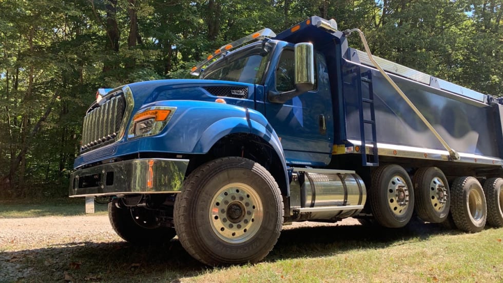 Blue truck with dump body