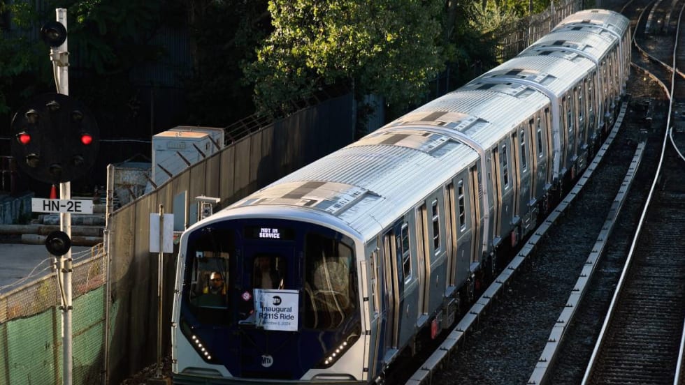 The R211S subway car traveling along the rails of Staten Island.