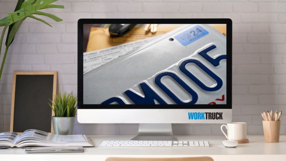 Computer screen showing license plate and title