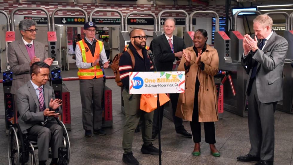 Sri Michael Carrasquillo receives his award