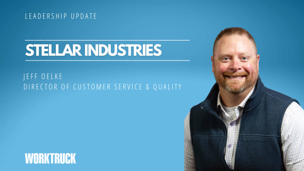 Man in business attire against a blue background with company name Stellar Industries.