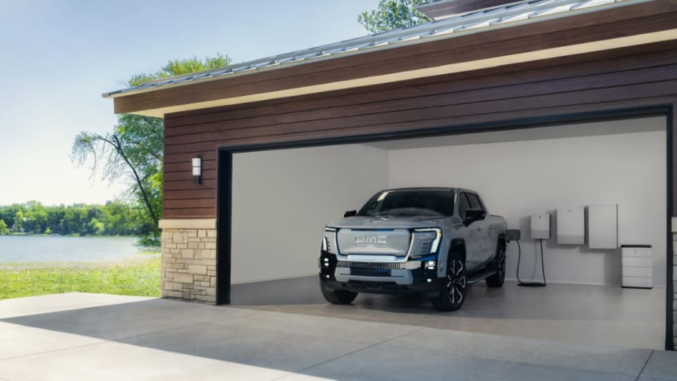 2025 GMC Sierra EV Denali in a garage 