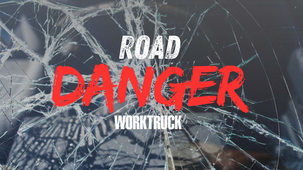 Broken glass with ROAD DANGER