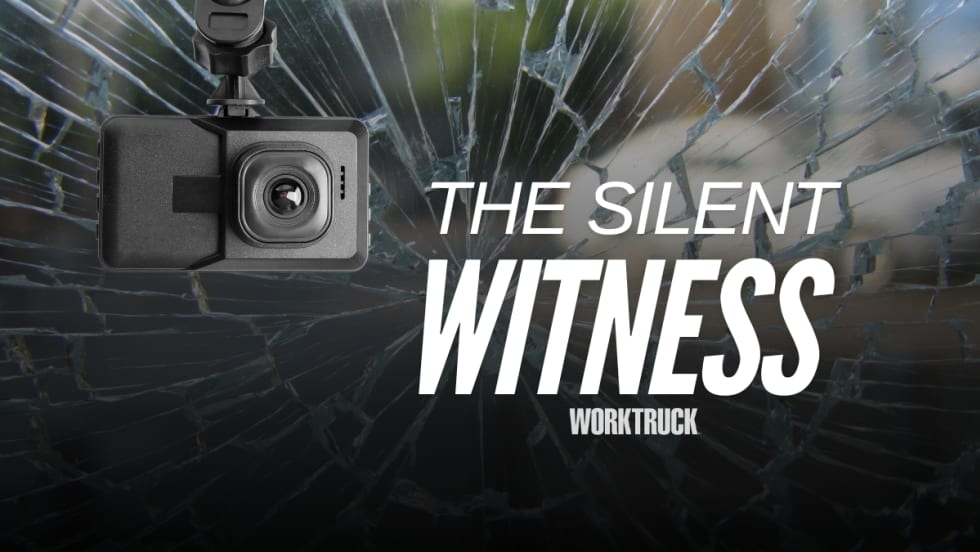 Broken glass with a dashcam and the words: The Silent Witness, Work Truck
