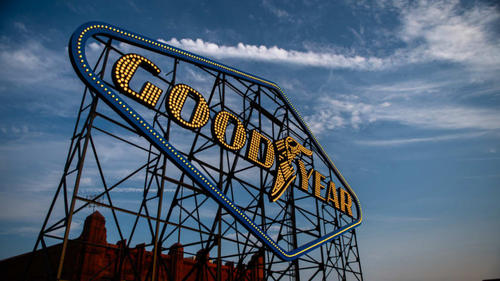 Goodyear sign against a blue sky.