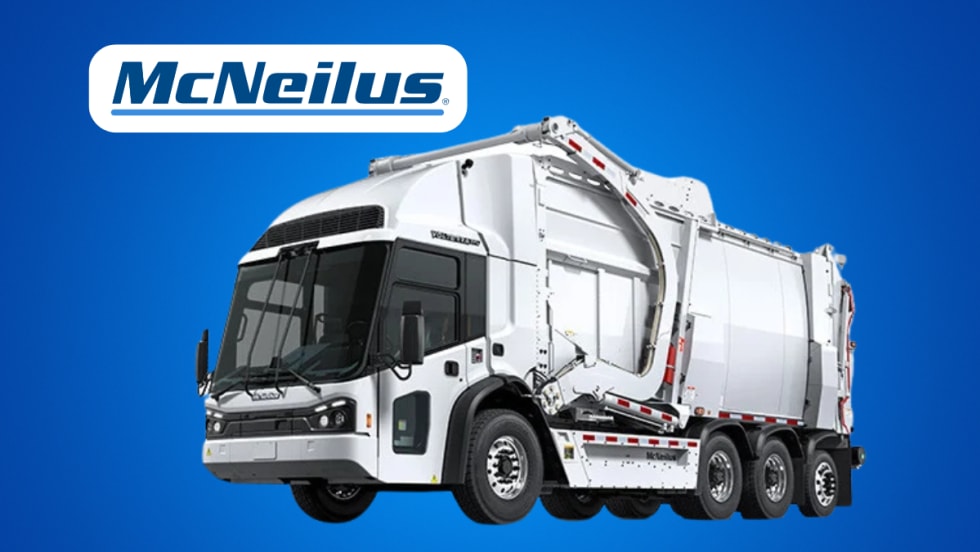 White refuse truck against blue background with company name, McNeilus, inset.