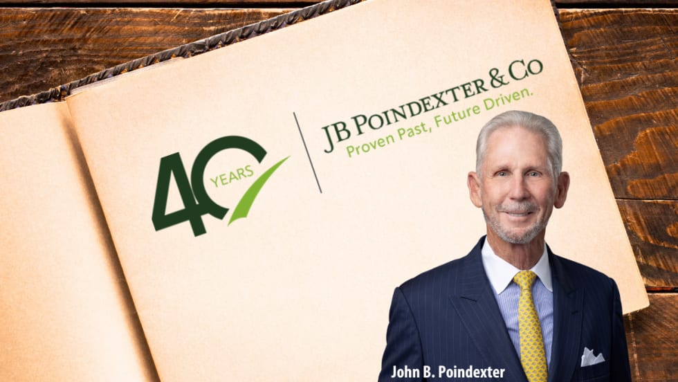 open book with text for 40th anniversary of a company and inset photo of the founder.